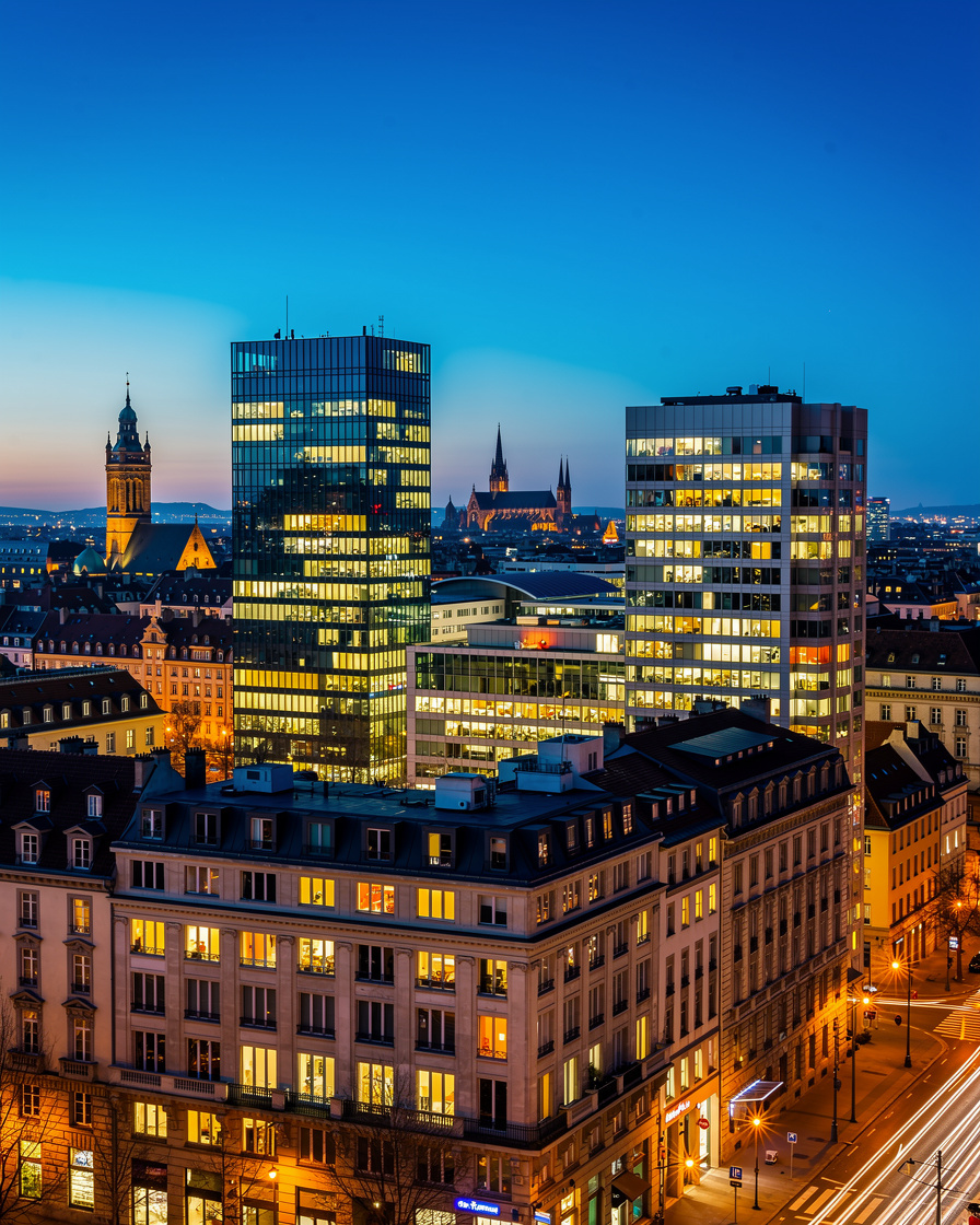 European city skyline at dusk with office towers